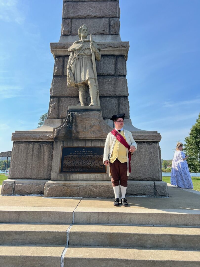 Garrett Posing with Andrew Lewis Statue in WV Garrett Posing with Andrew Lewis Statue in WV